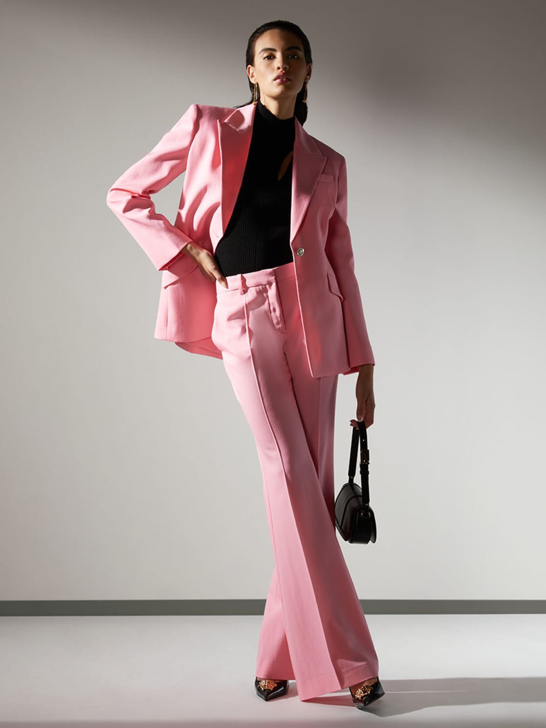 Woman in Pink Tailoring Look