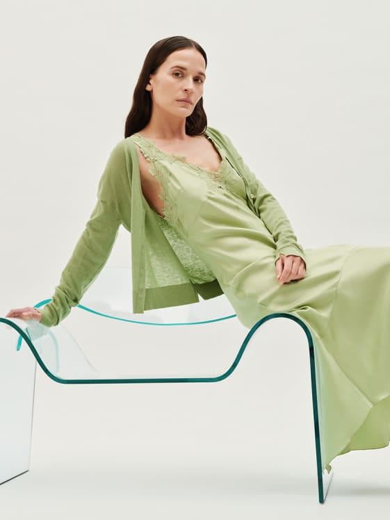 Female model wearing green outfit