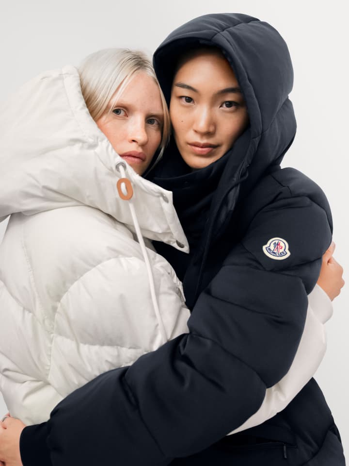 Two women wearing jackets